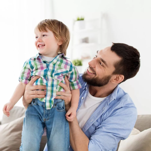 Happy Father Holding His Son